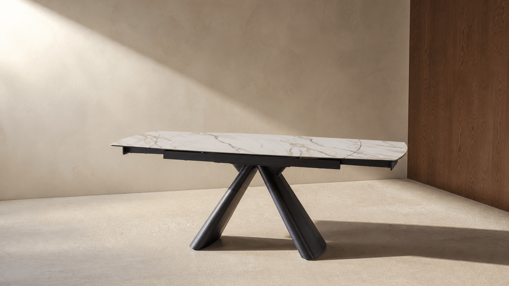 White ceramic ADORN T882 table in a sunlit plaster and limestone interior
