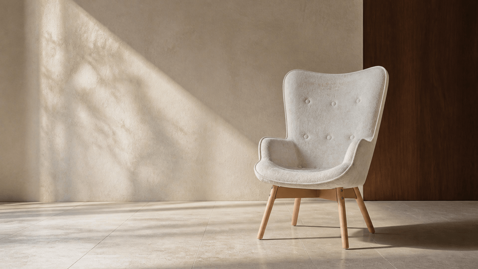 Cream ADORN ZZA02ft-1 armchair in a sunlit plaster and limestone interior